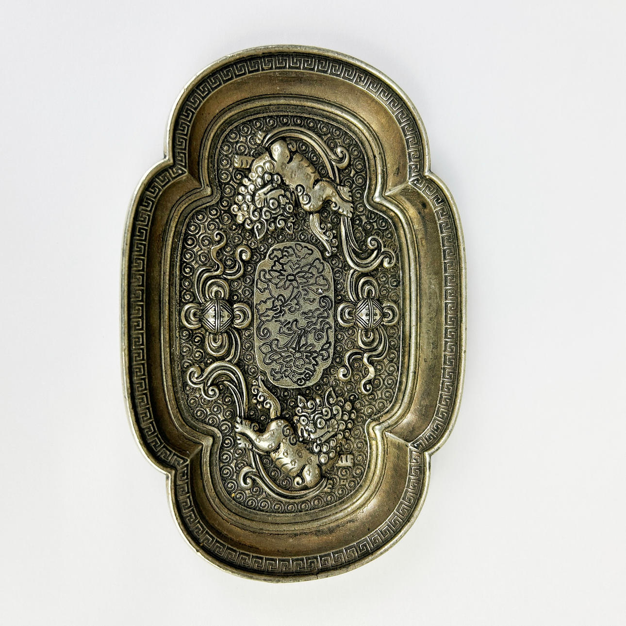 CHINESE WHITE METAL DISH.
