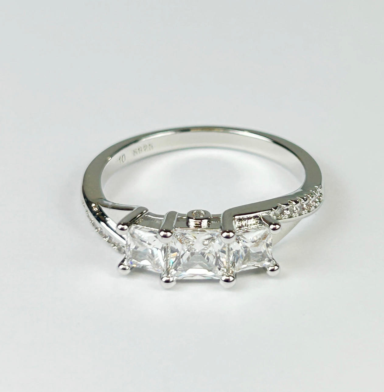 SILVER DRESS RING.