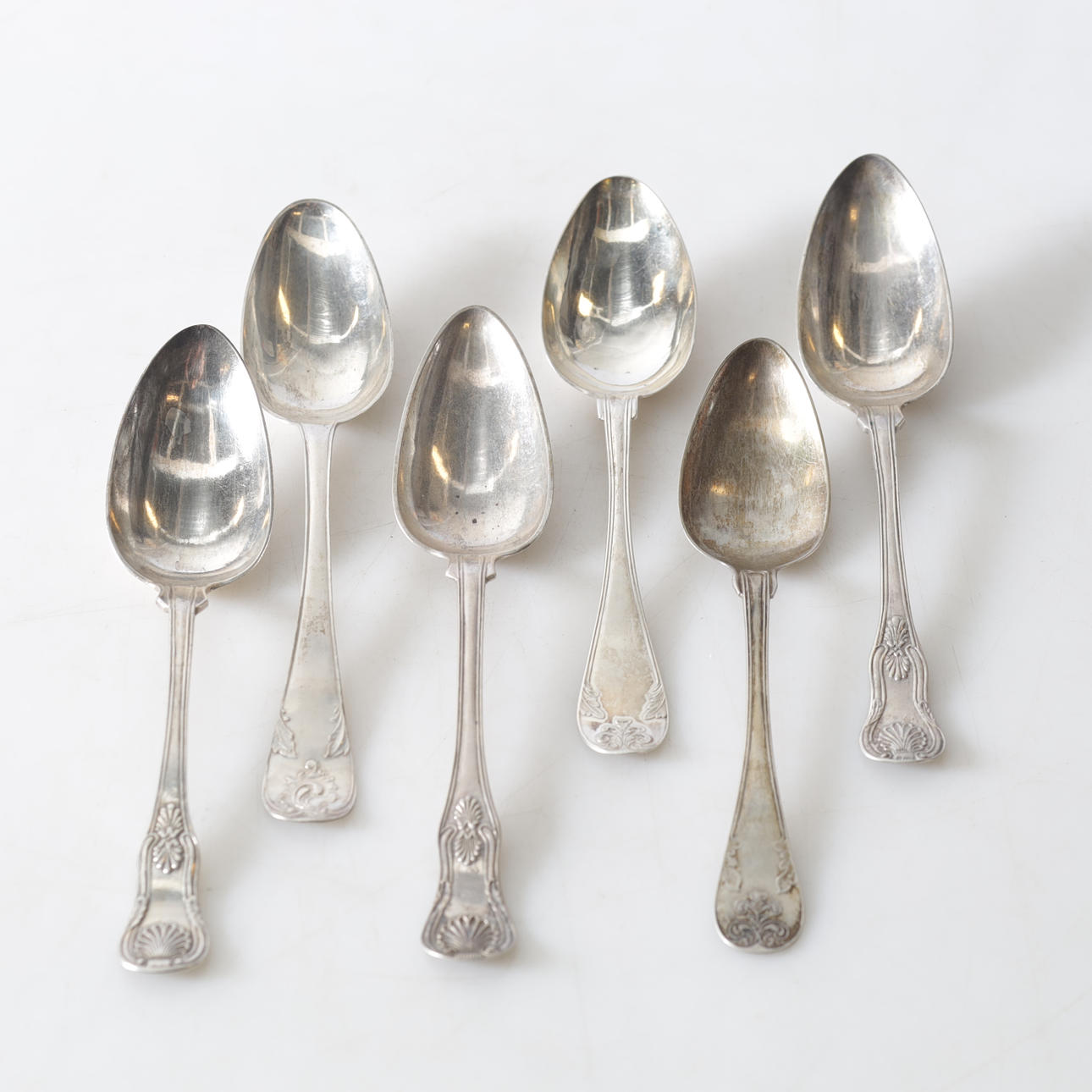 SPOONS, 6 silver, various makers & models. Total weight approx. 338.3 grams.