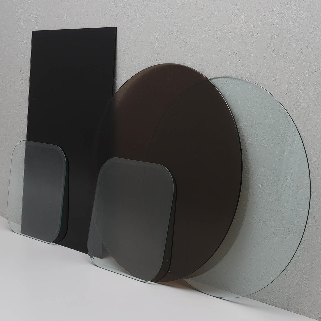 SAMLING BORDSSKIVOR, glas, 5 delar.