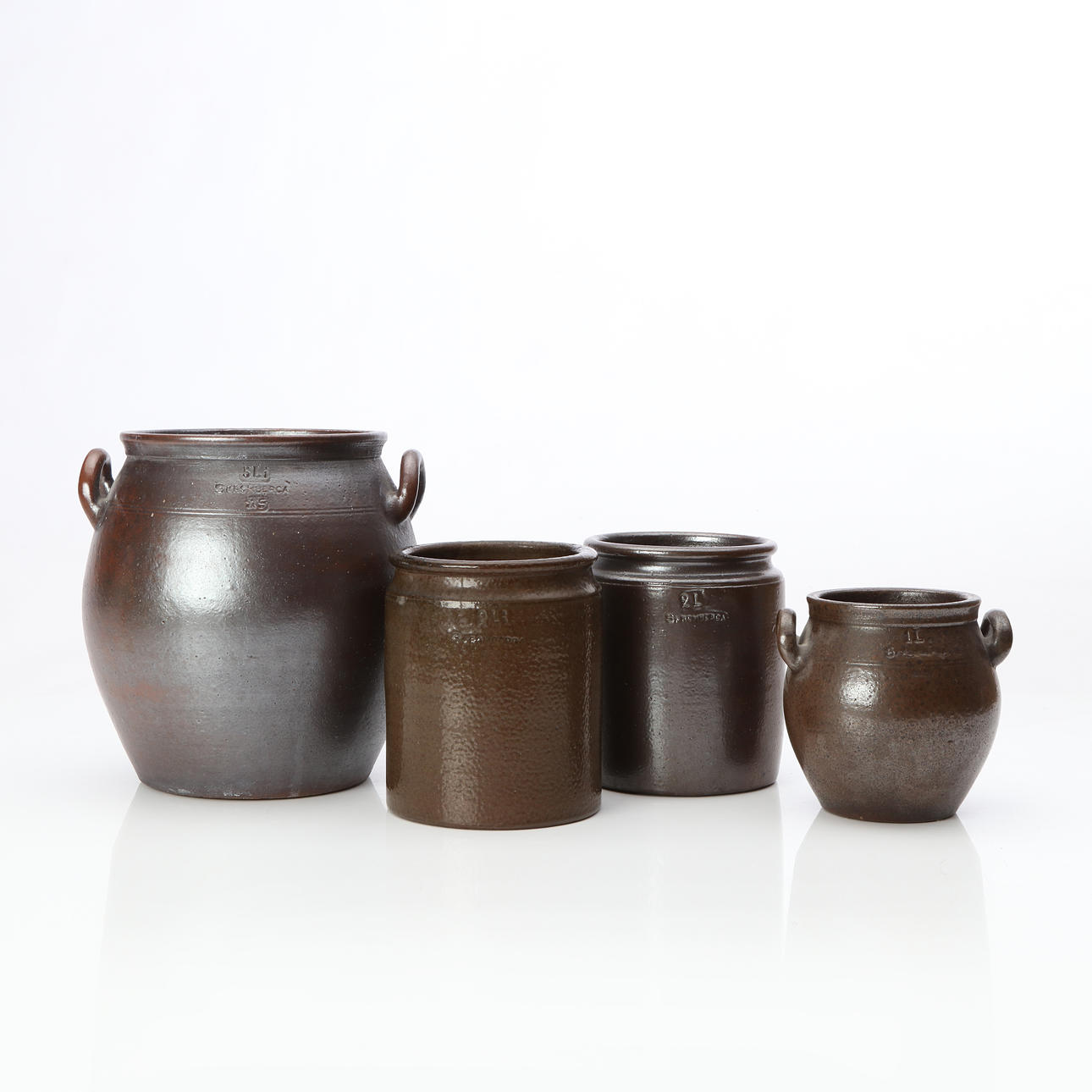 SKROMBERGA, JUGS, FOUR PCS. Glazed ceramic.