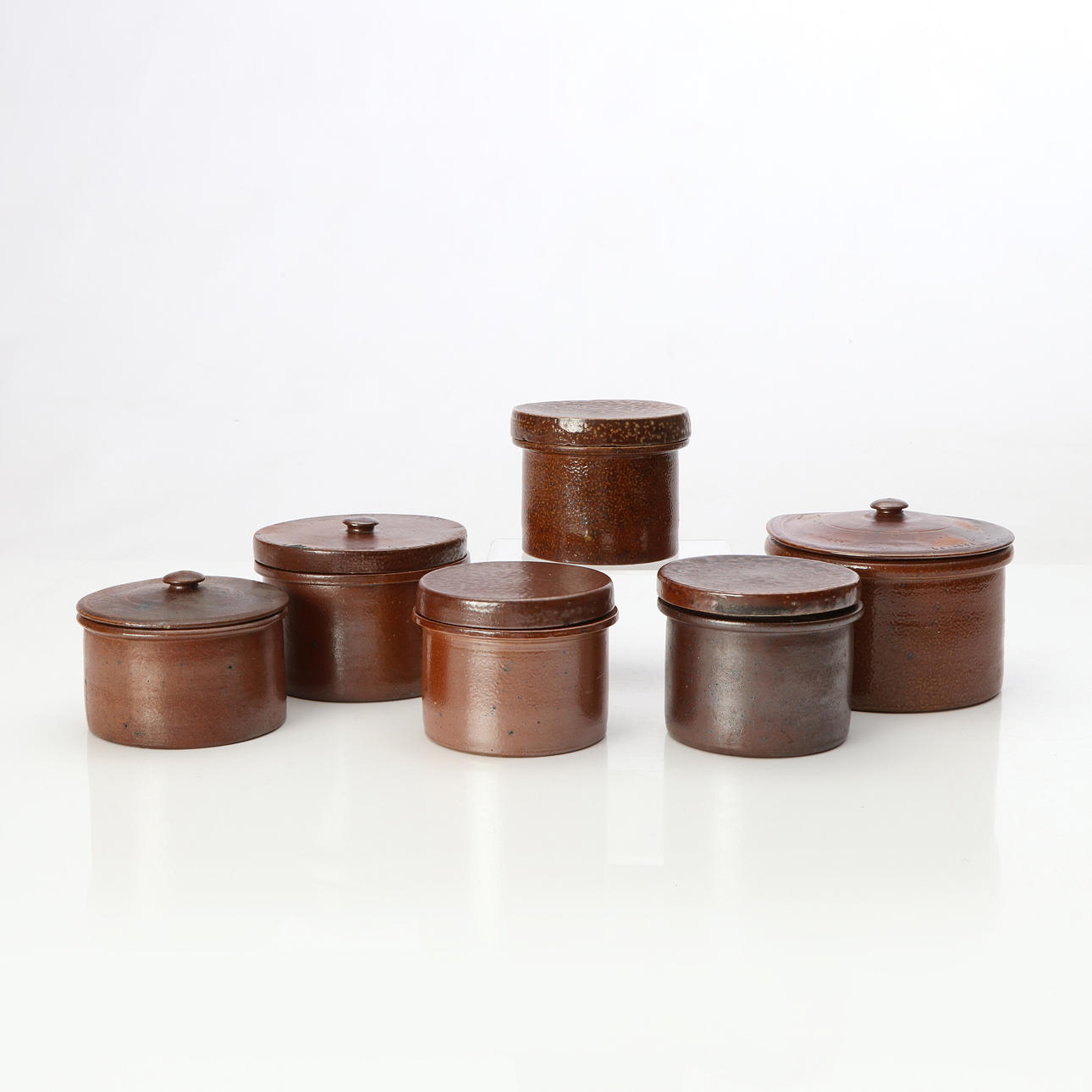 RAUS, CHEESE JARS, SIX PCS. Glazed ceramic. 20th century.