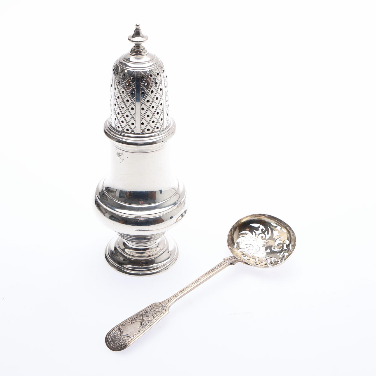 SILVER GEORGIAN STYLE SUGAR SIFTER AND A SIFTER SPOON. (2). Silver ...