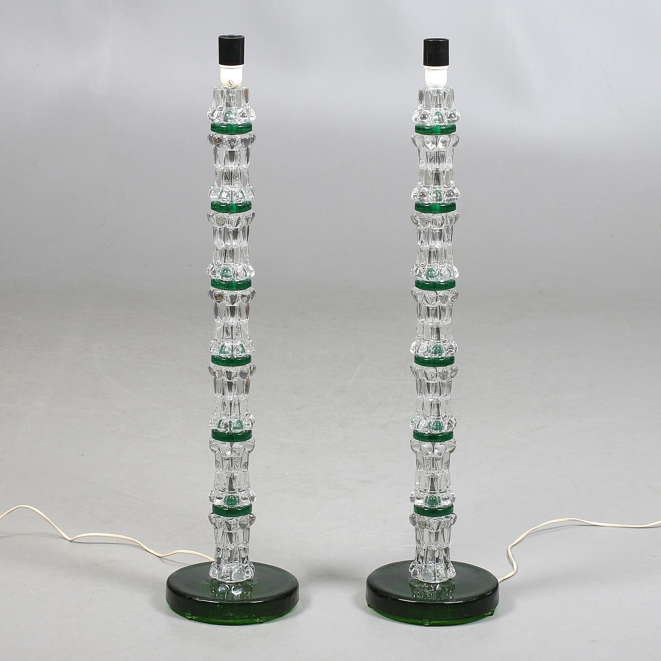 CARL FAGERLUND. Golvlampor, ett par, glas, Orrefors, 1960-tal.