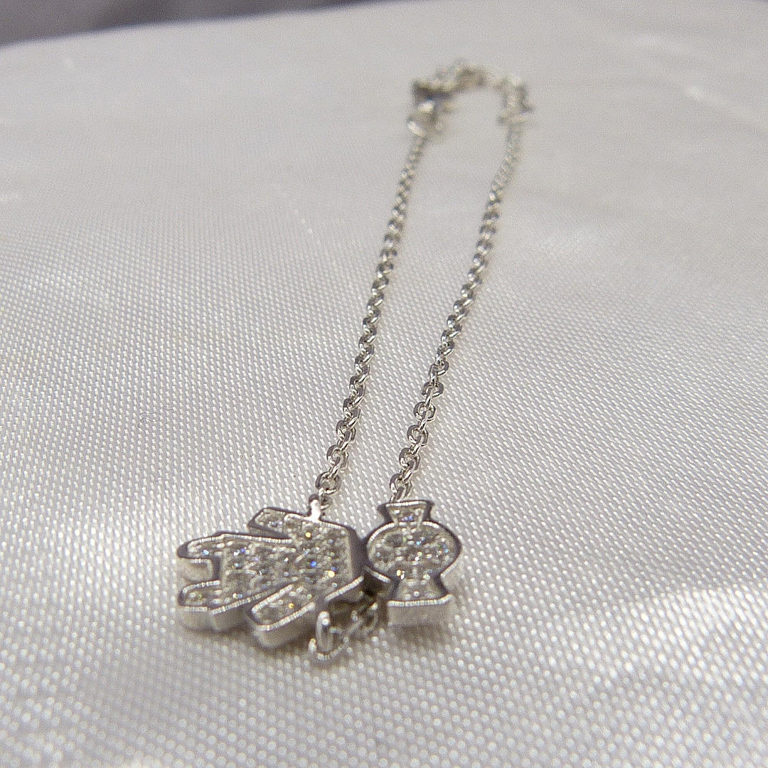 A SILVER "DOLLY" BRACELET.