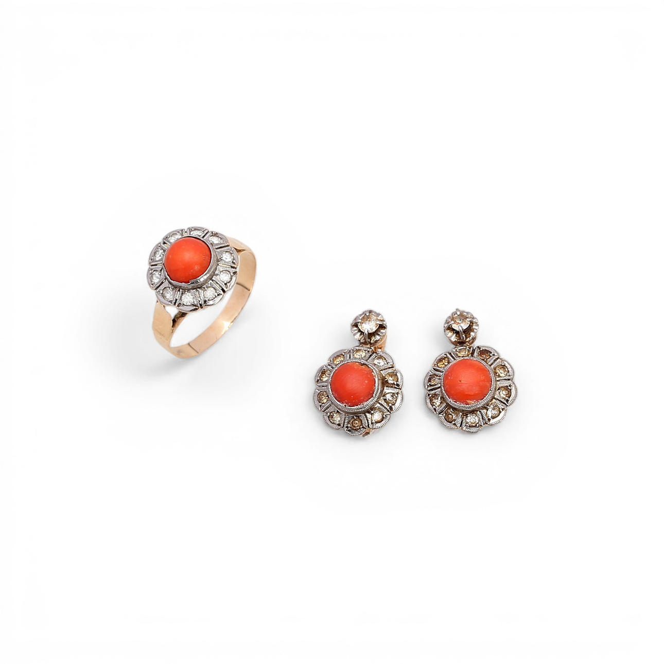 Gold and gemstones earrings and ring set.