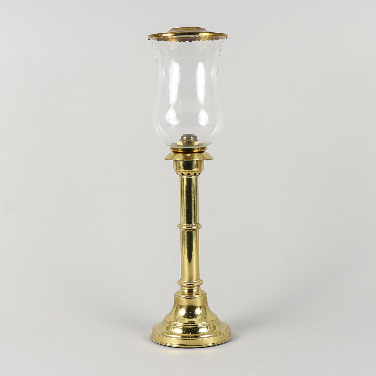 LJUSLYKTA mässing och glas.