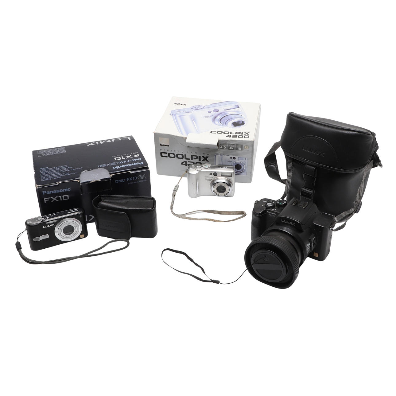 TWO LUMIX DIGITAL CAMERAS WITH ANOTHER.