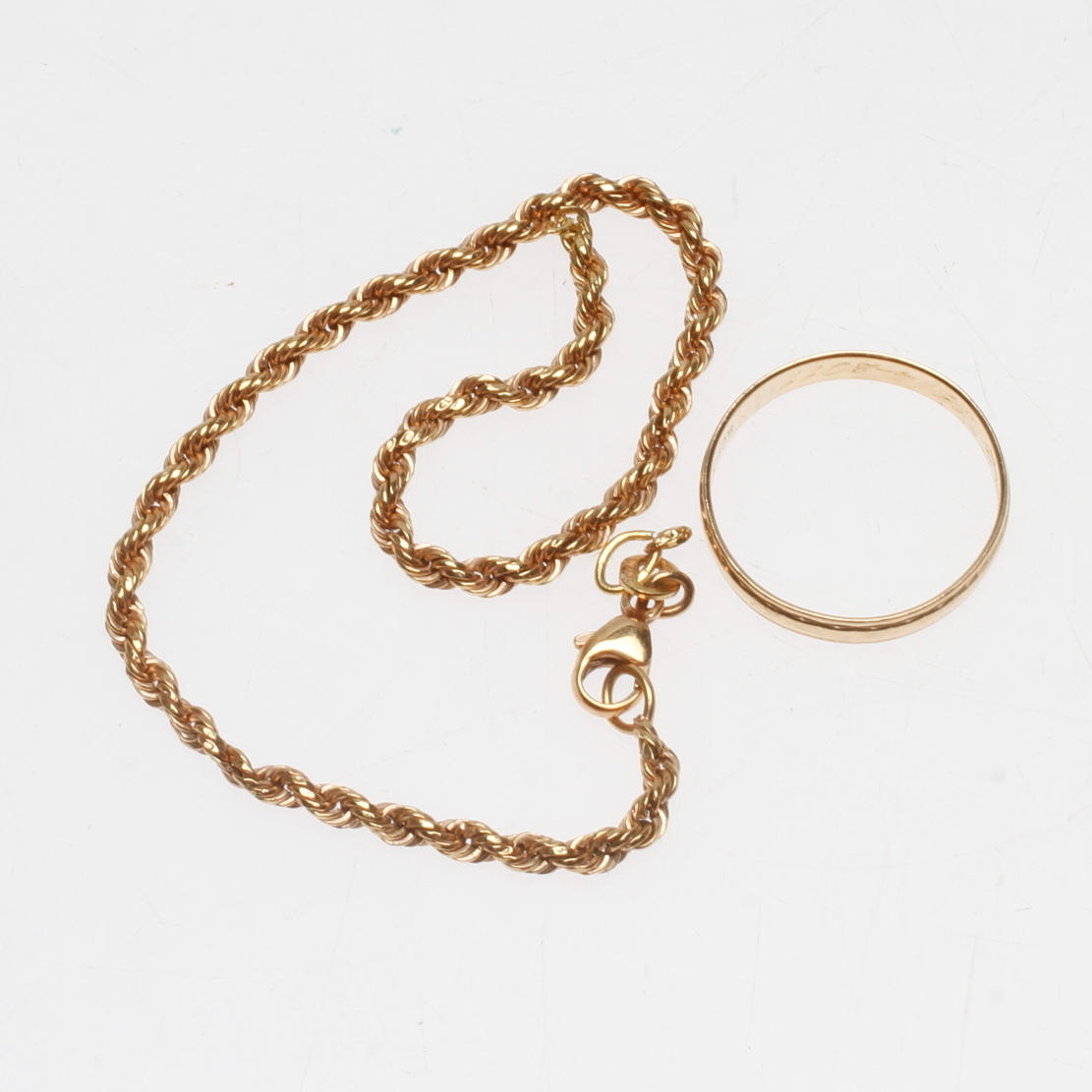 GULDSMYCKEN, 18k guld, vikt ca 3,6 gr.