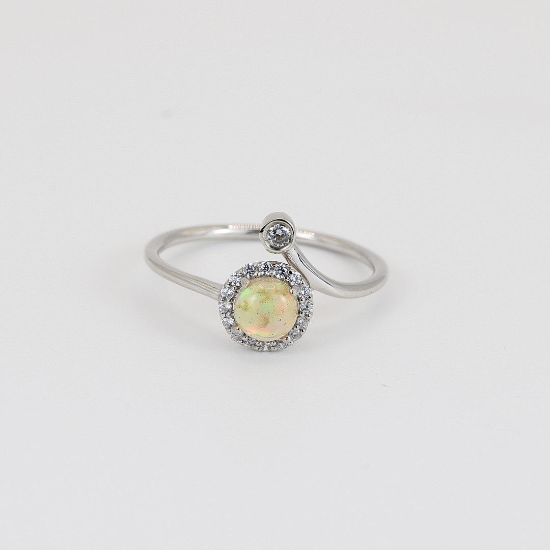 SILVER OPAL SET RING.