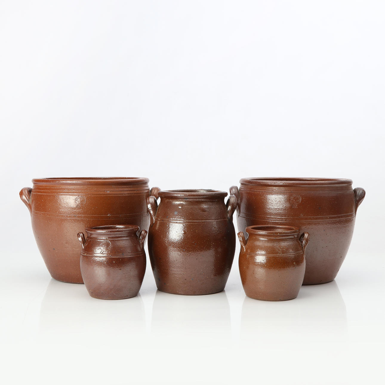 JUGS, FIVE. Salt-glazed stoneware. Helsingborg 1880-1922.