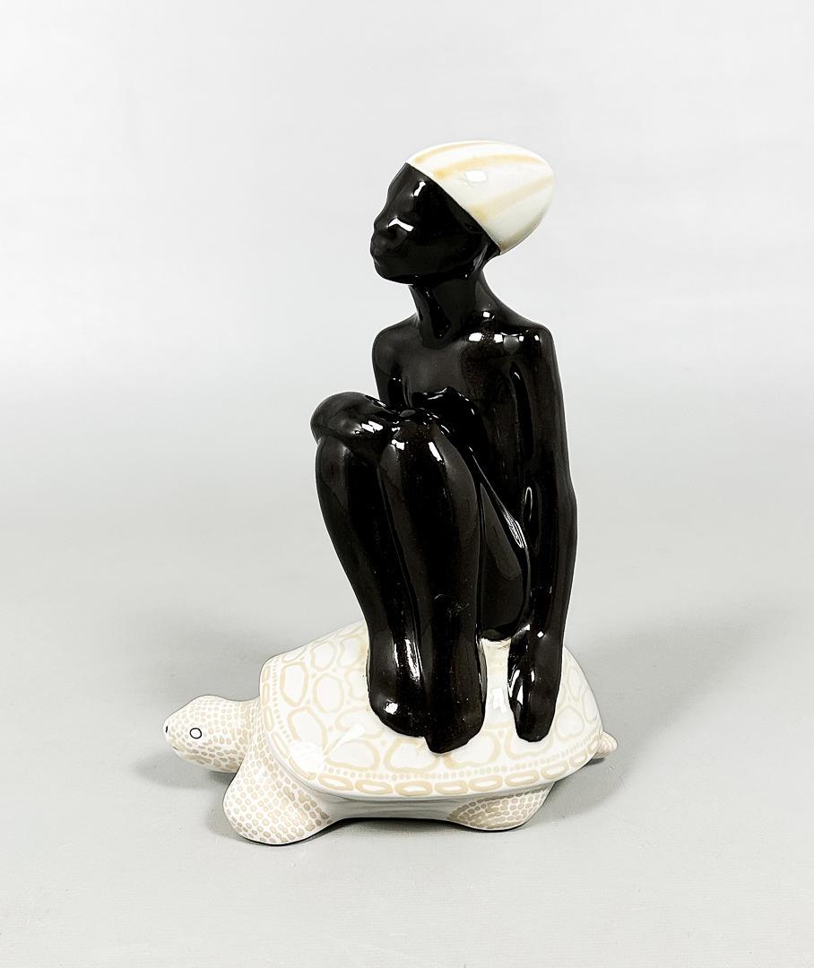 MARI SIMMULSON. FIGURINE, "Boy on turtle", glazed earthenware, signed, Upsala-Ekeby.