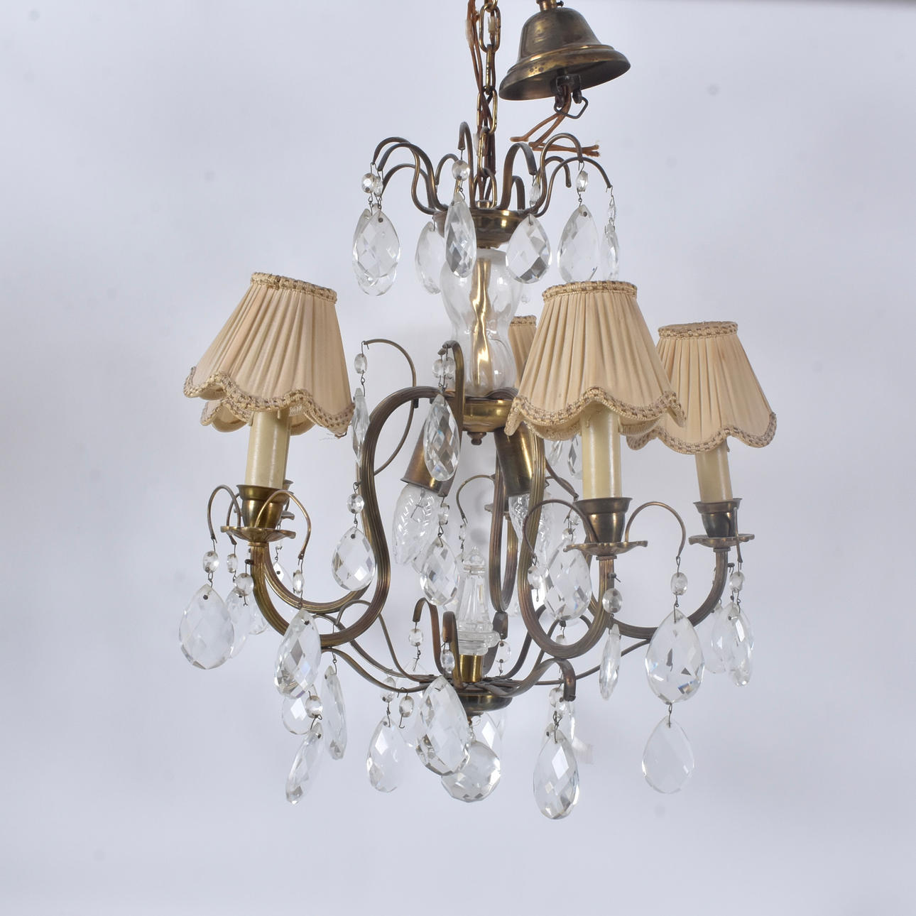 CHANDELIER; brass with leaf-shaped prisms.