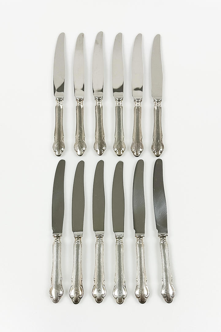 12 Knives. Silver MEMA.