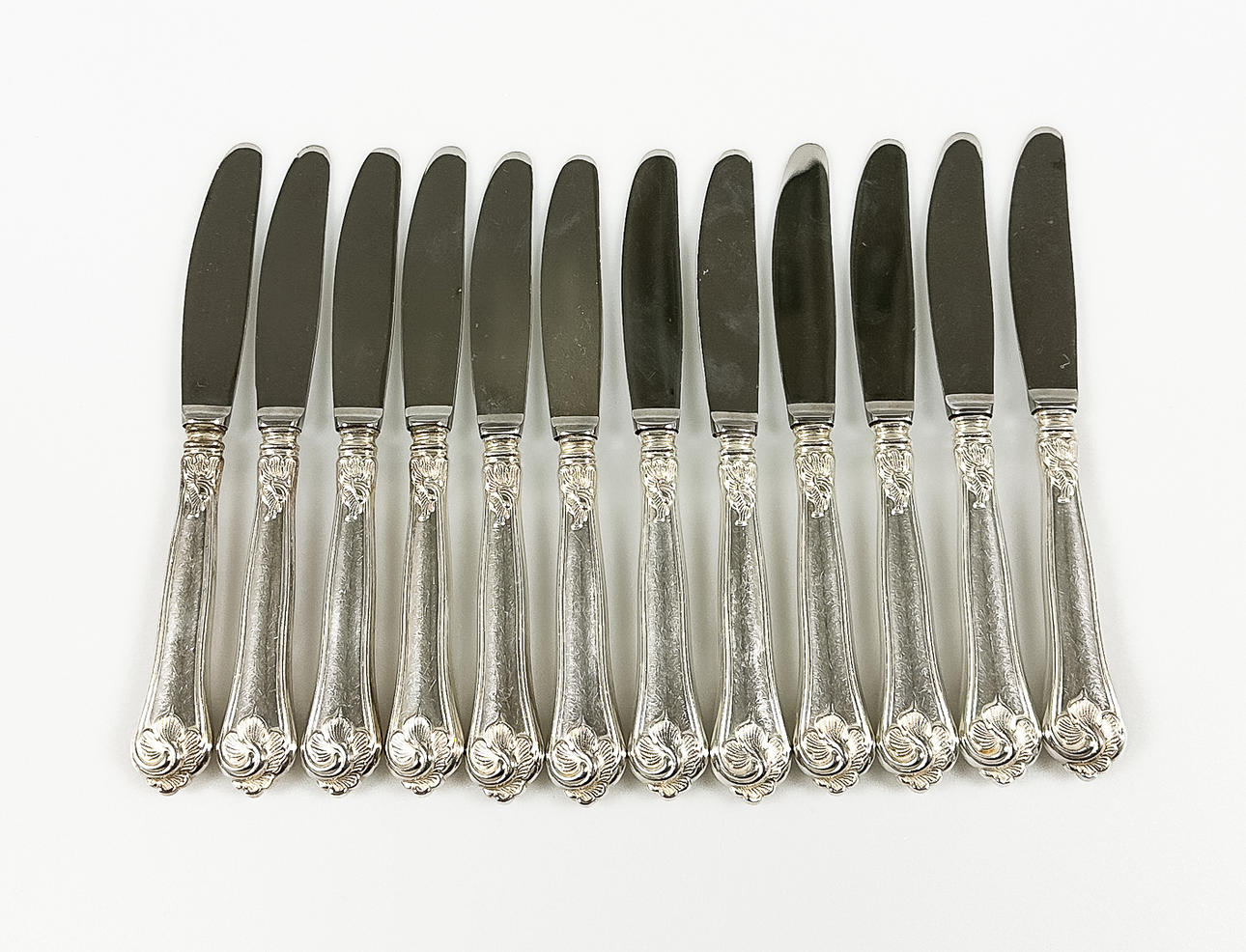 12 Knives. Silver. Cohr.