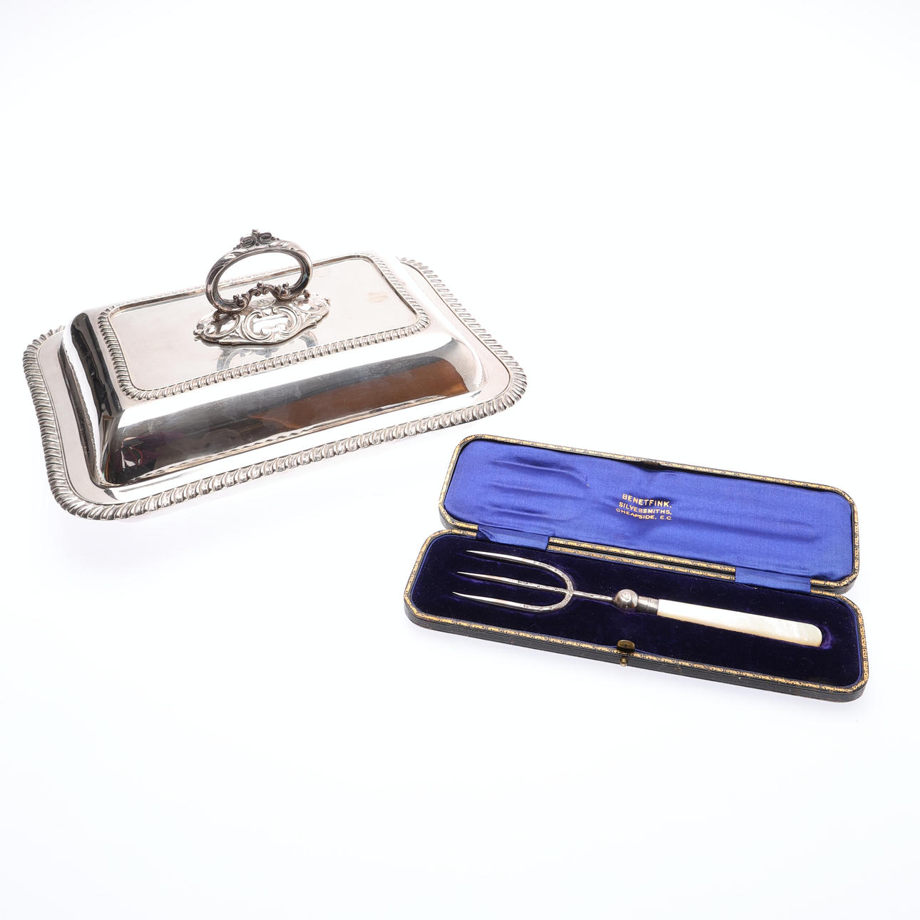 GEORGE V SILVER BREAD FORK, CASED, AND SILVER PLATED ENTREE DISH. (2).