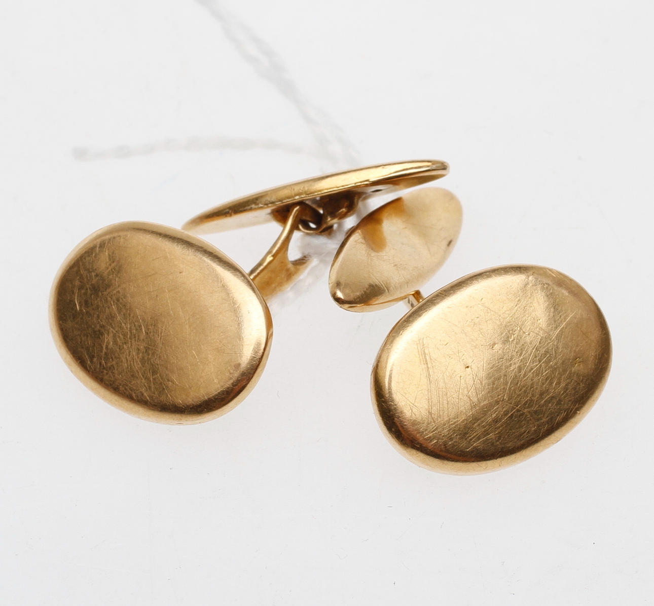 SKJORTKNAPPAR, 1 par, 18k guld, vikt ca 5,4 gr.