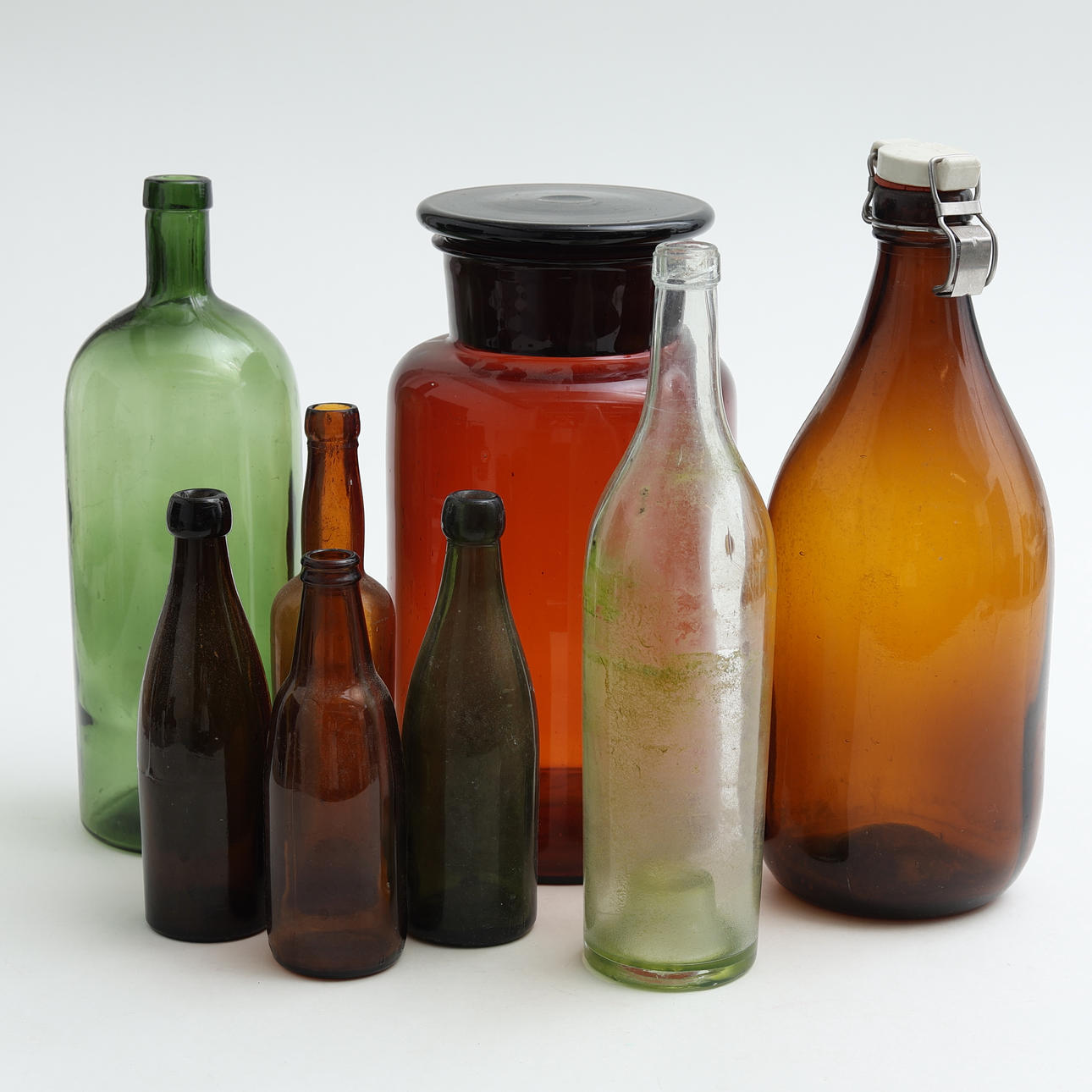 GLASS BOTTLES, 8 pcs, 20th century.