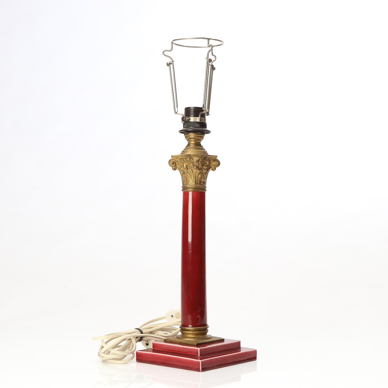 TABLE LAMP. Ceramic and brass. Column-shaped. 20th century.