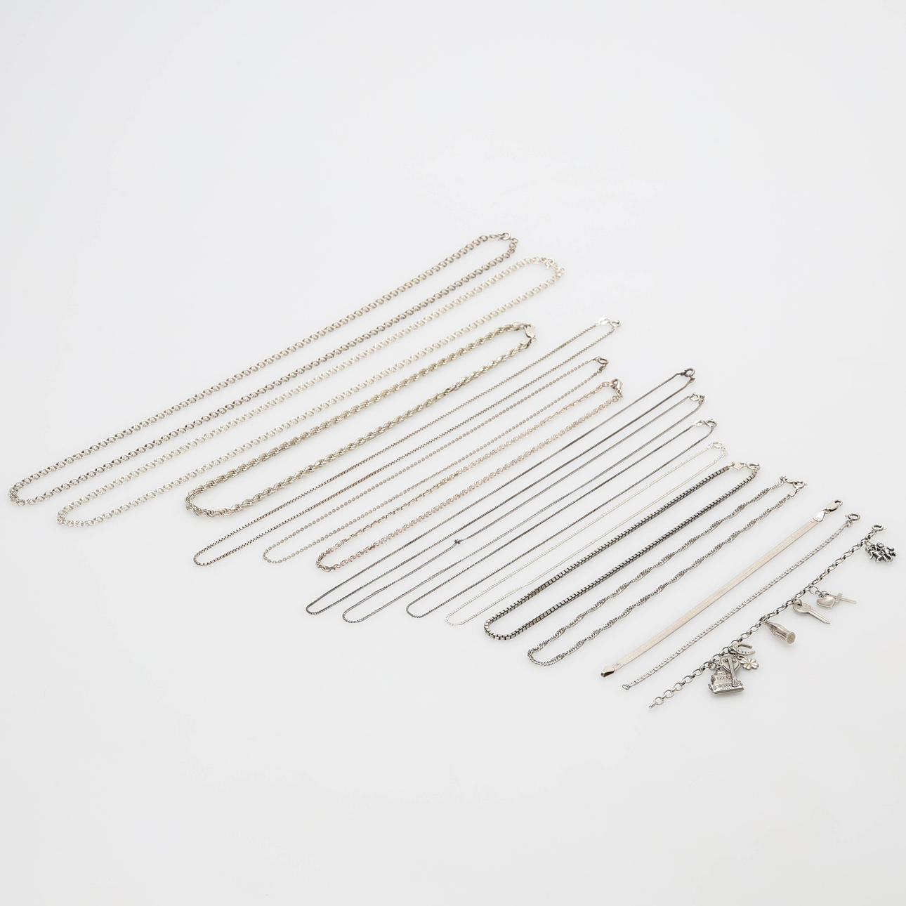 NECK CHAINS and BRACELETS, 15 pcs, silver, weight 124 grams.