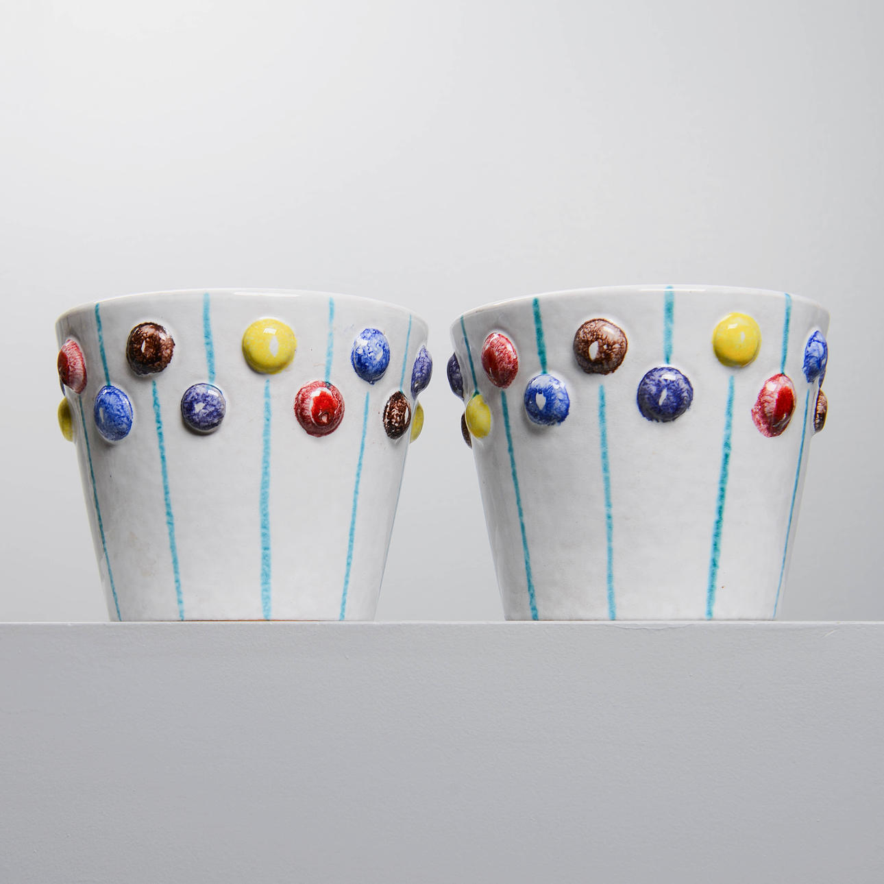 ATTRIBUTED TO FRATELLI FANCIULLACCI. Cache-pots, a pair, ceramic, Italy, second half of the 20th century.