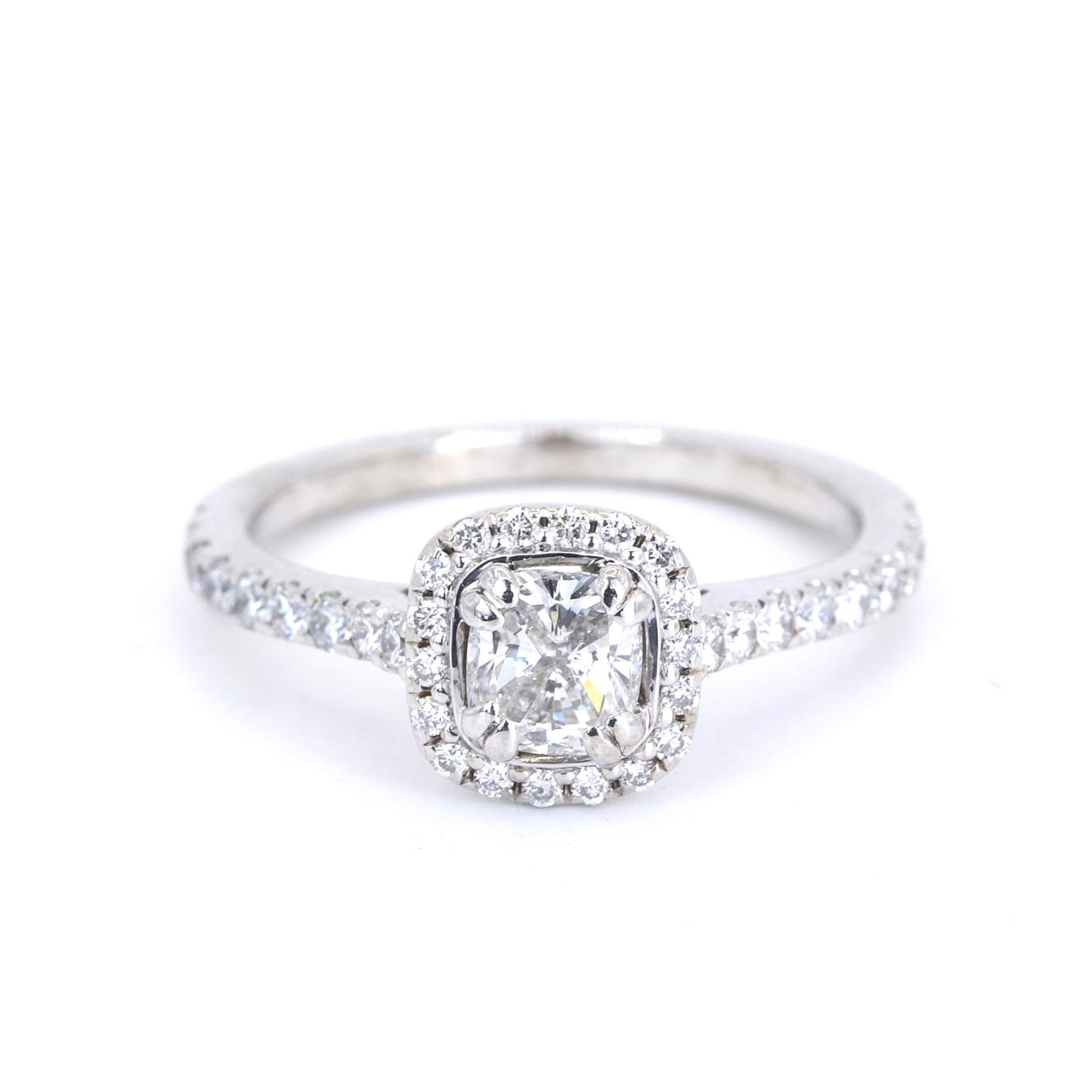 0.9 CT DIAMOND HALO RING.