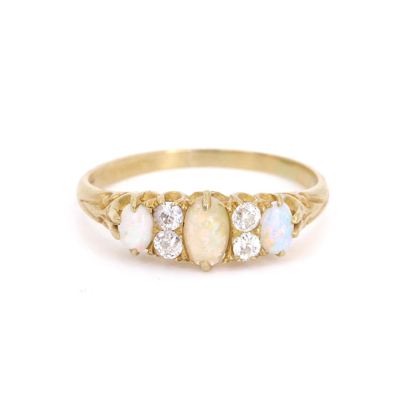 18CT GOLD OPAL AND DIAMOND SET RING.