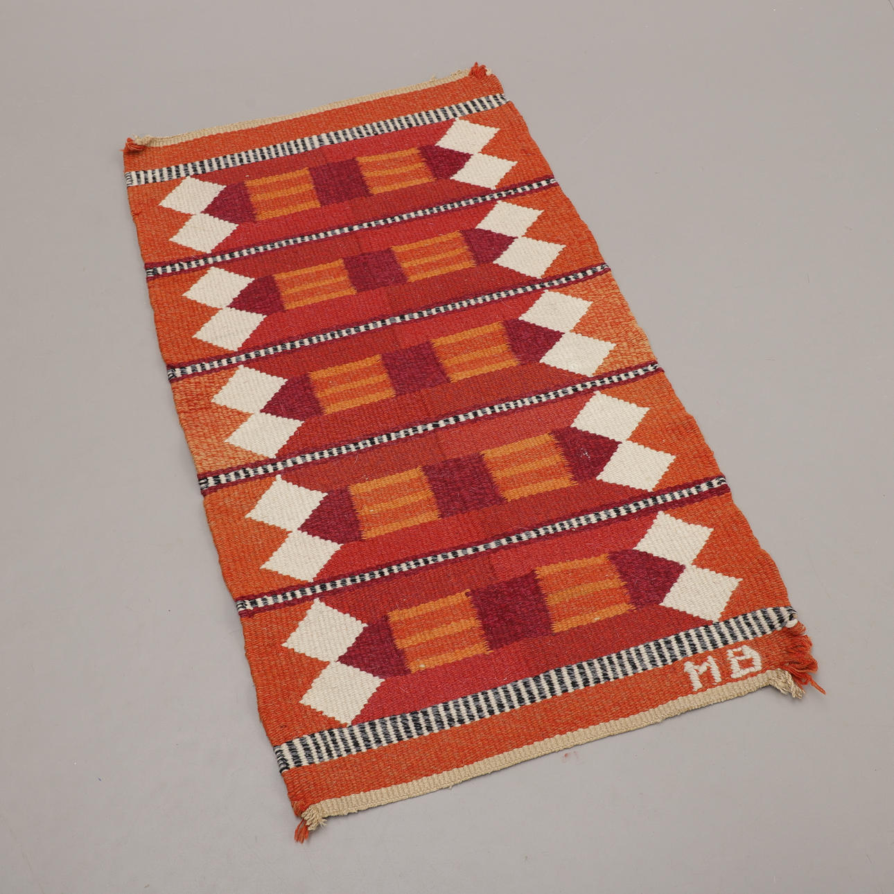 WALL HANGING, signed MB.