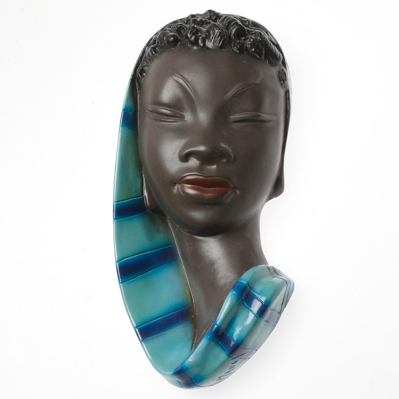 GINO MANCA. Väggrelief, keramik. Ansikte. Signerad.