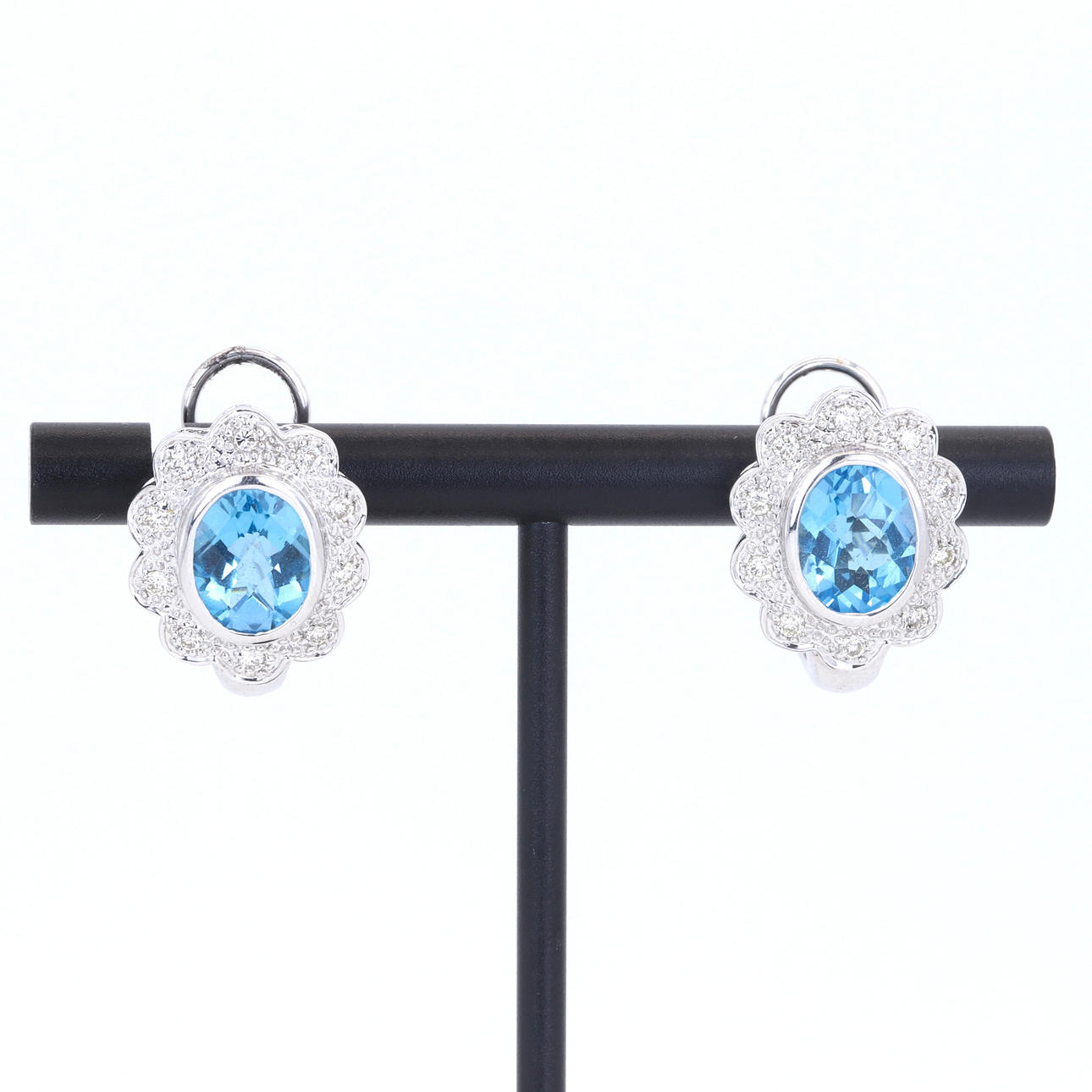 18CT BLUE TOPAZ & DIAMOND EARRINGS.