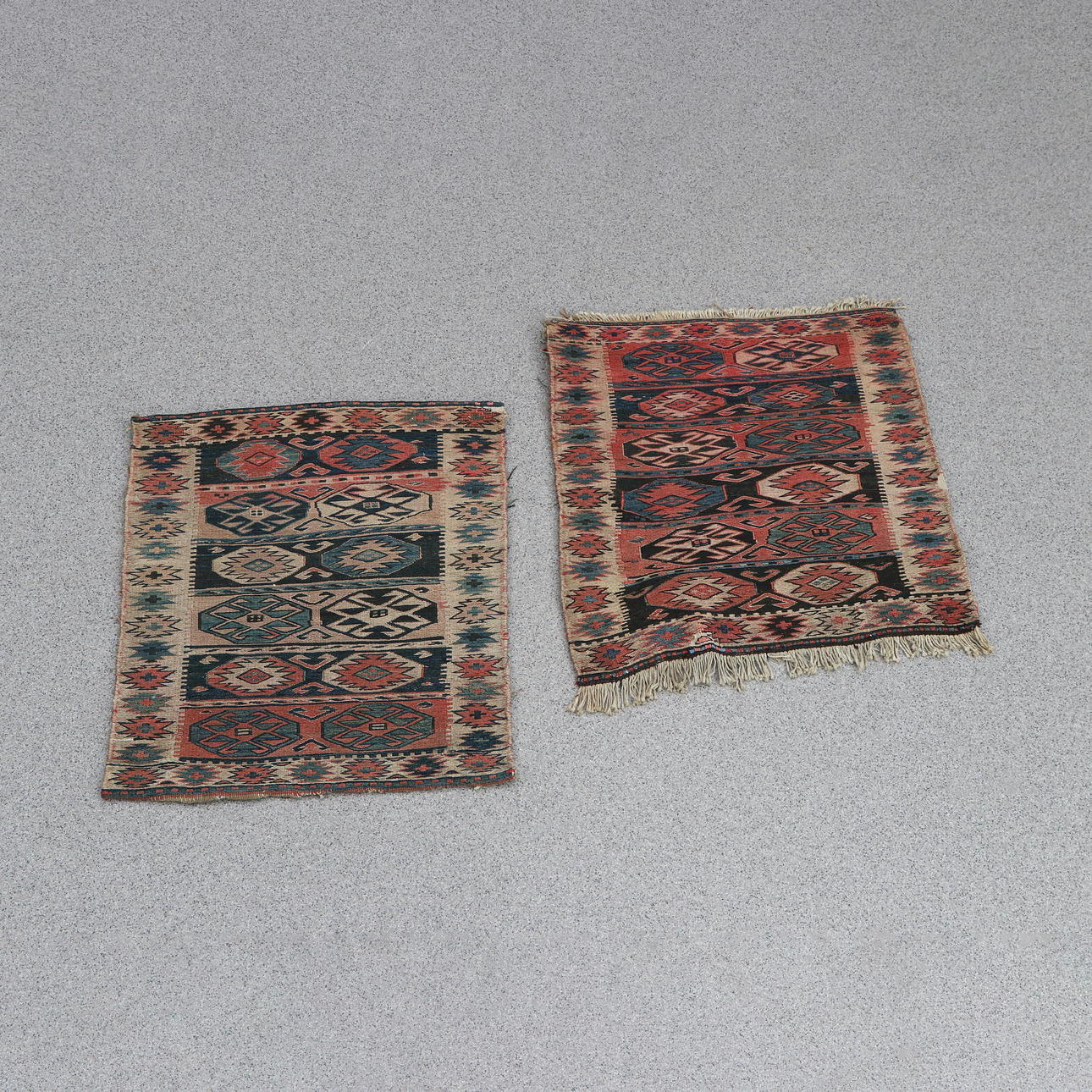 TEXTILES, TWO. Wool on cotton warp. Mid-20th century. Probably Turkey.