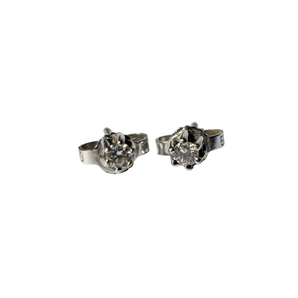 14K white gold and diamond earrings.