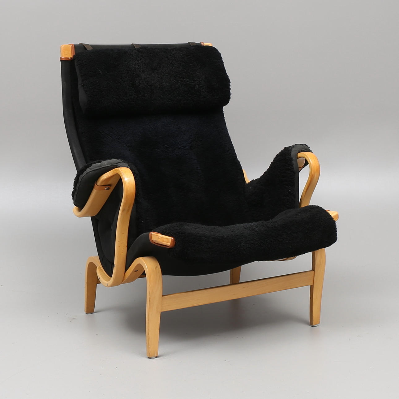 BRUNO MATHSSON. Fåtölj, fårpäls, "Pernilla", Dux.