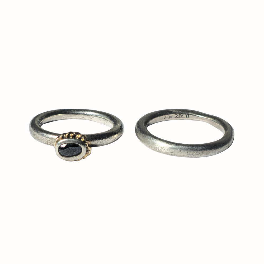 Two silver and cabochon sapphire rings.