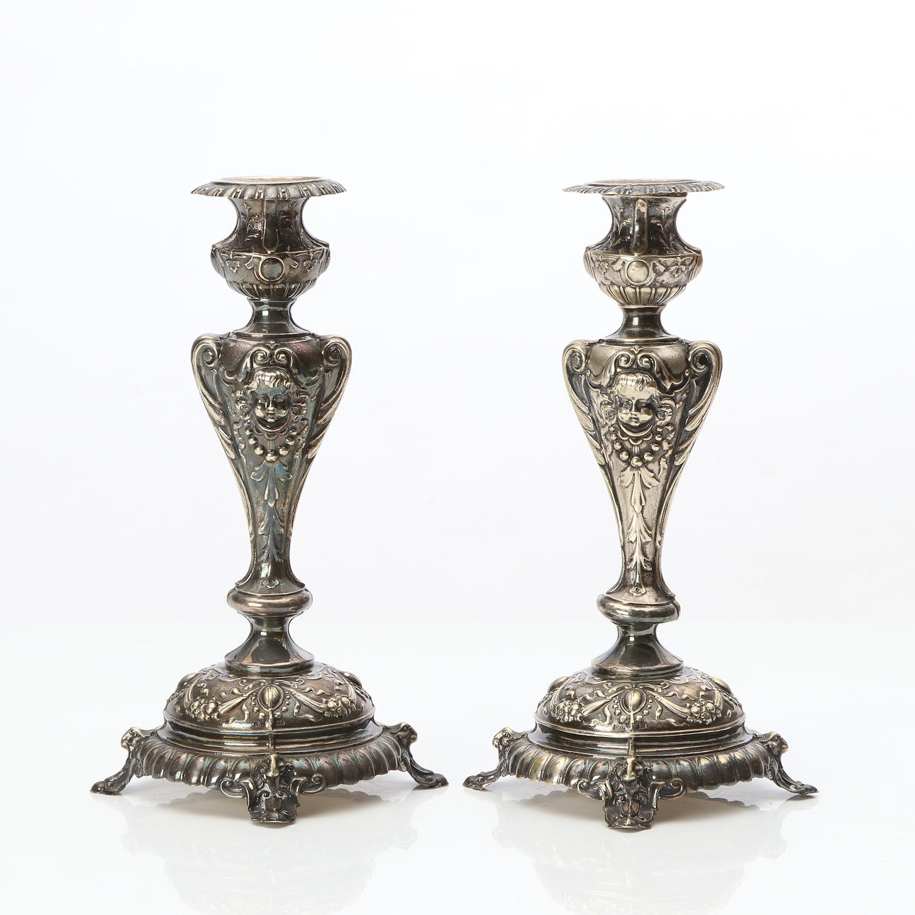 CANDLESTICKS, A PAIR. Nickel silver. Circa 1900.