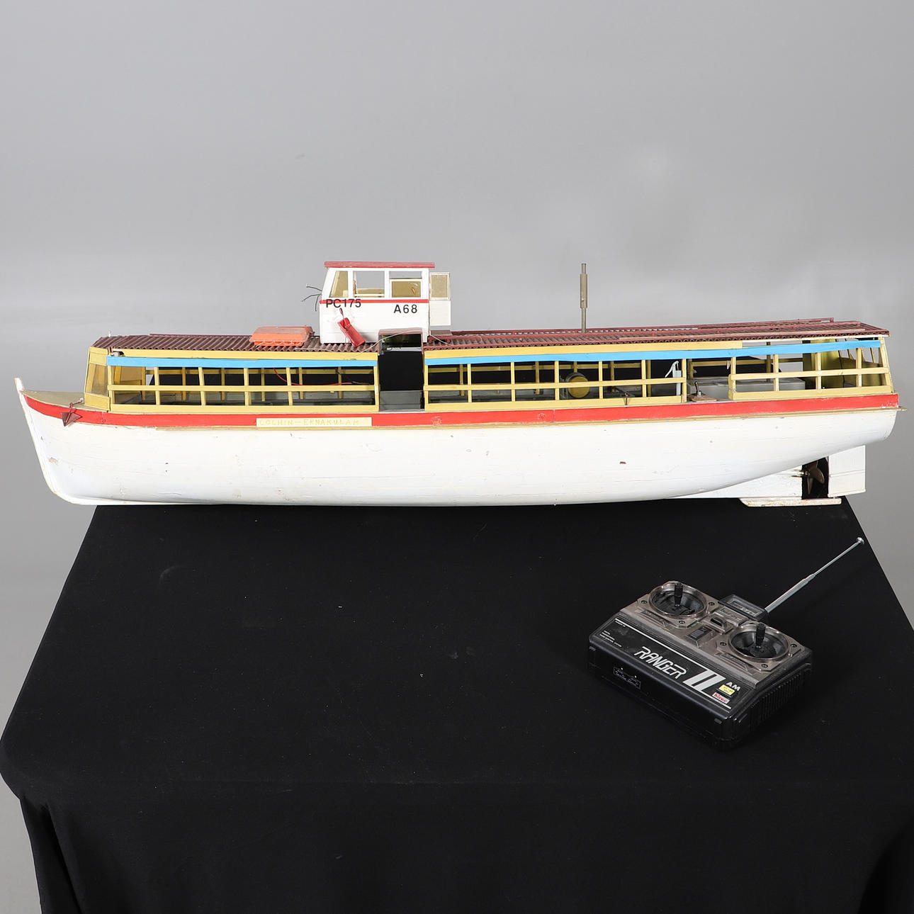 A SCRATCH-BUILT REMOTE CONTROLLED RIVER CRUISE BOAT.