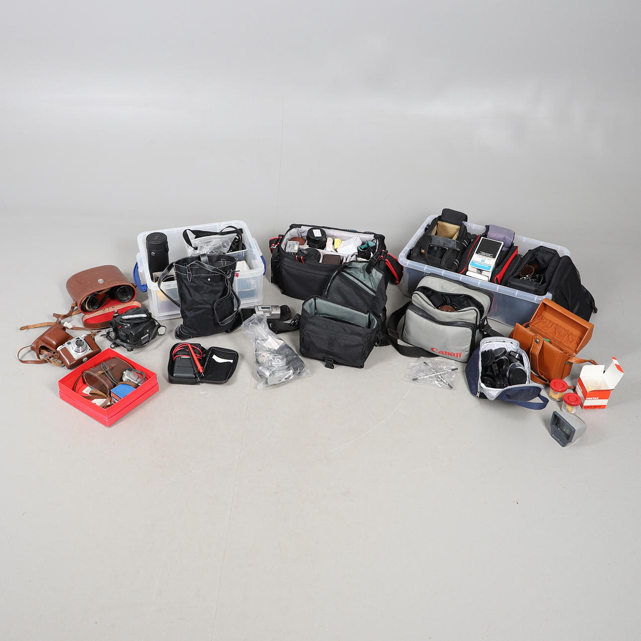 EXTENSIVE ASSORTMENT OF CAMERA AND OPTICAL ACCESSORIES.
