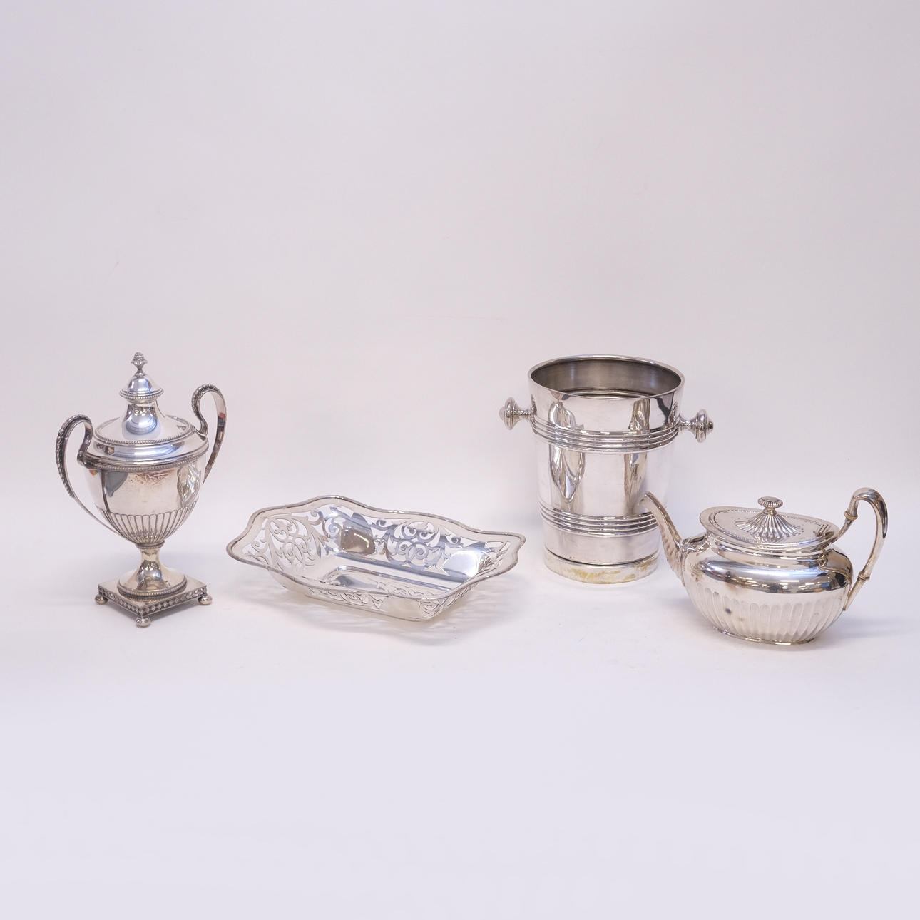 OBJECTS OF NICKEL SILVER, FOUR PIECES.