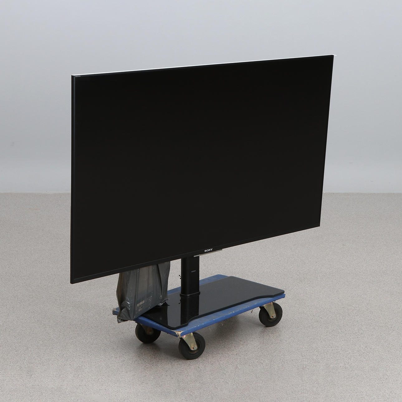 SONY, TV, 55". On stand. Model KDL-55W809C.