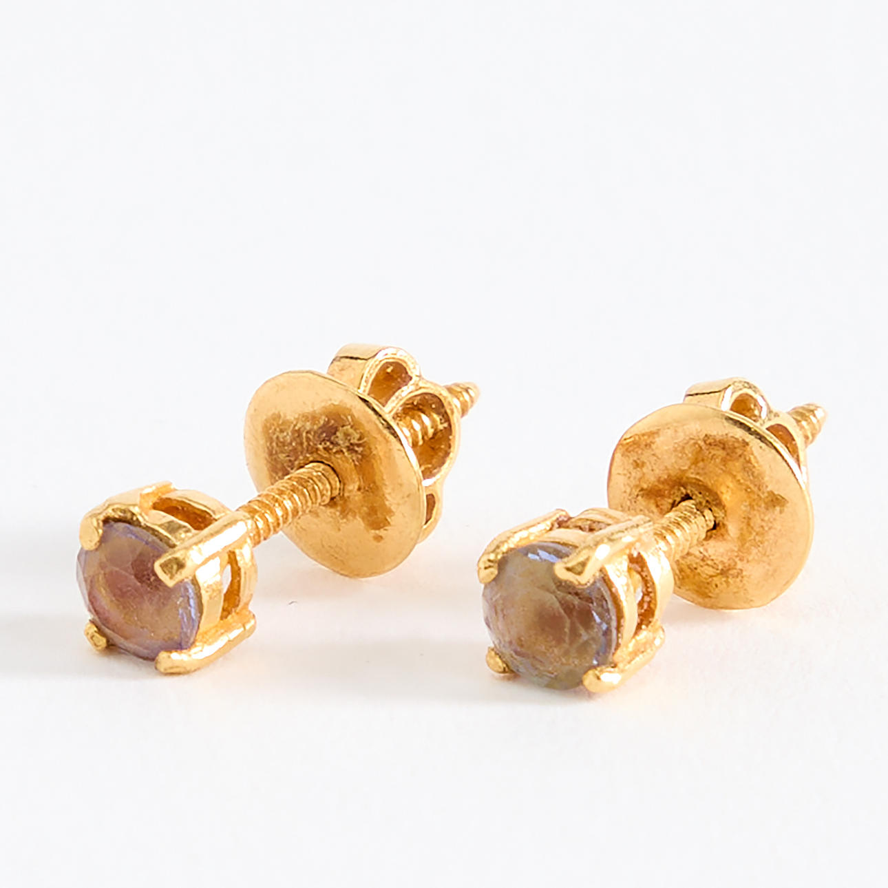 EARRINGS, a pair, 18K gold and tanzanite.