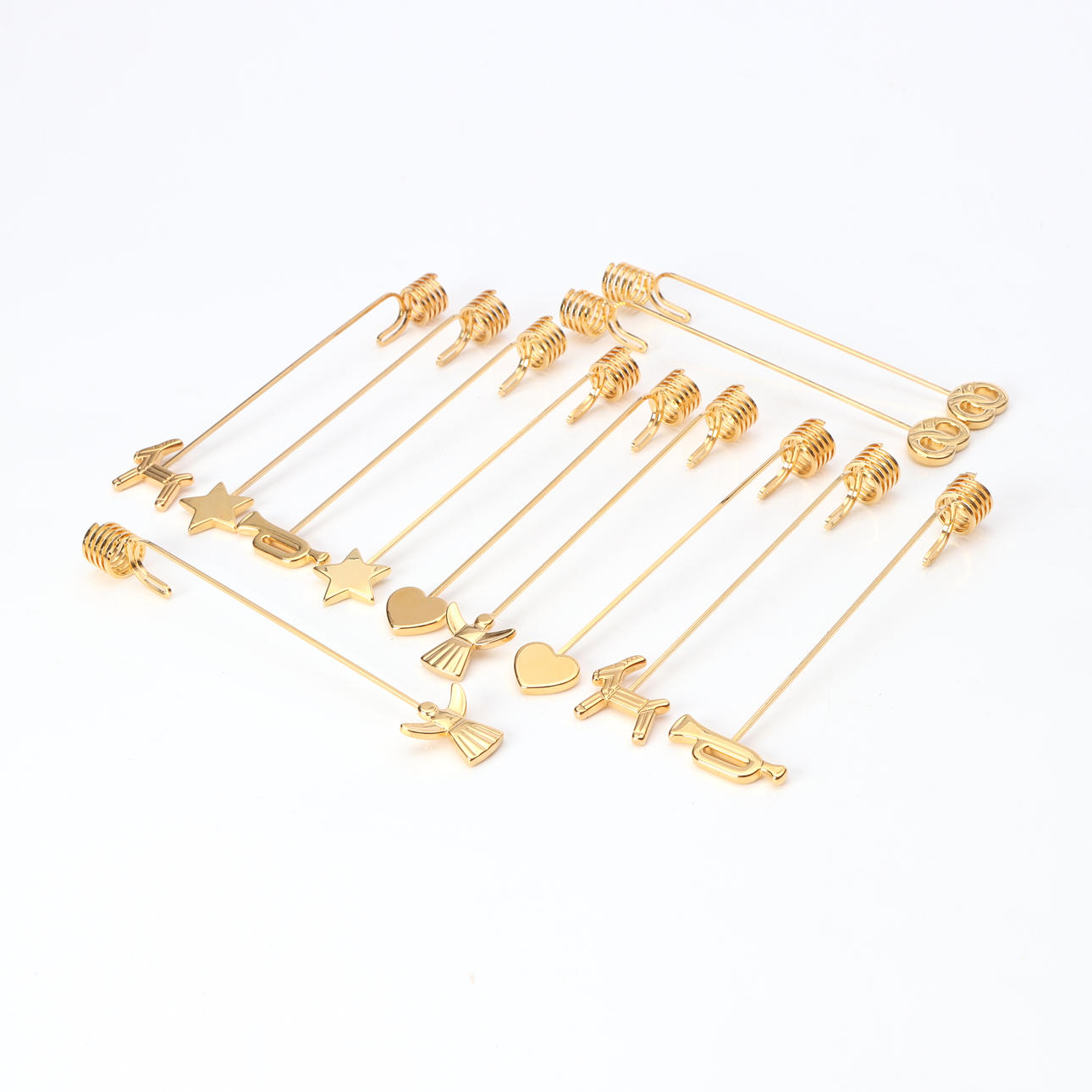 ANDREAS MIKKELSEN. CANDLE HOLDERS, 12 PCS. Gilt metal. Georg