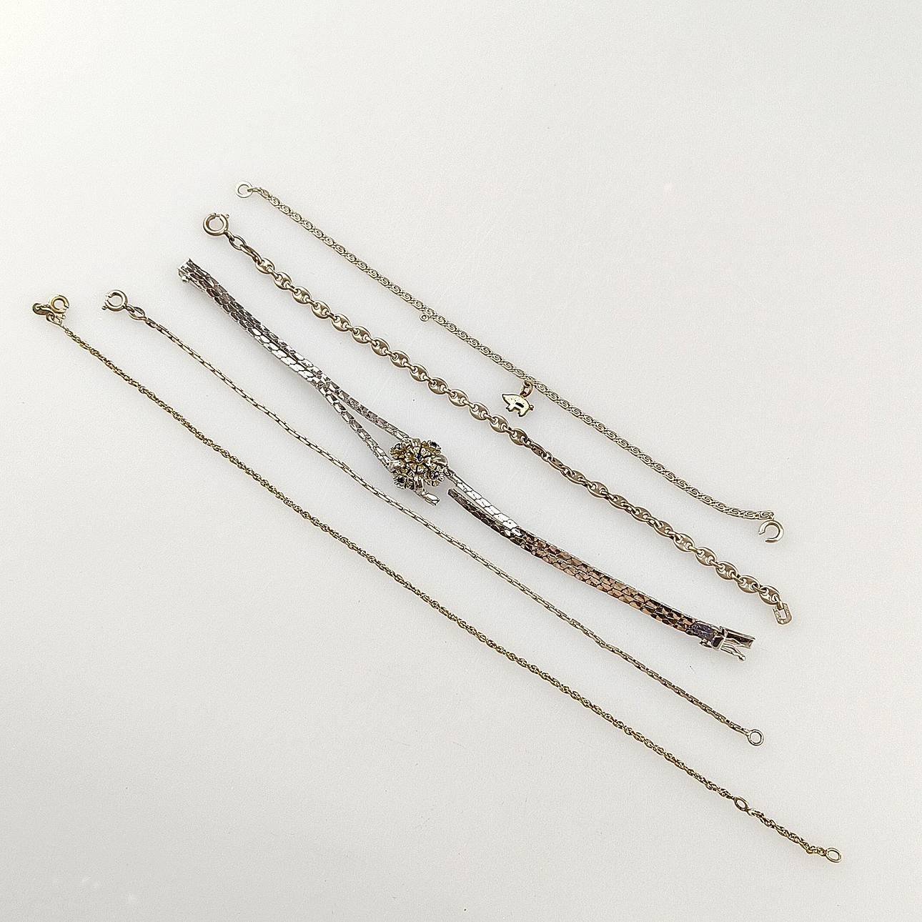 COLLECTION OF SILVER BRACELETS.