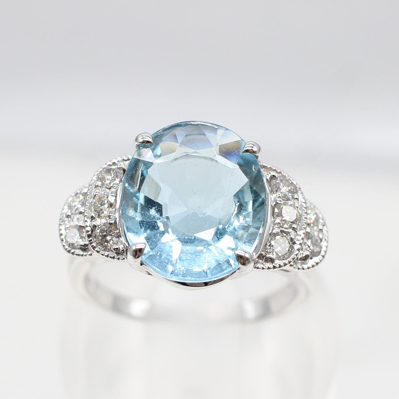 LARGE AQUAMARINE & DIAMOND RING.