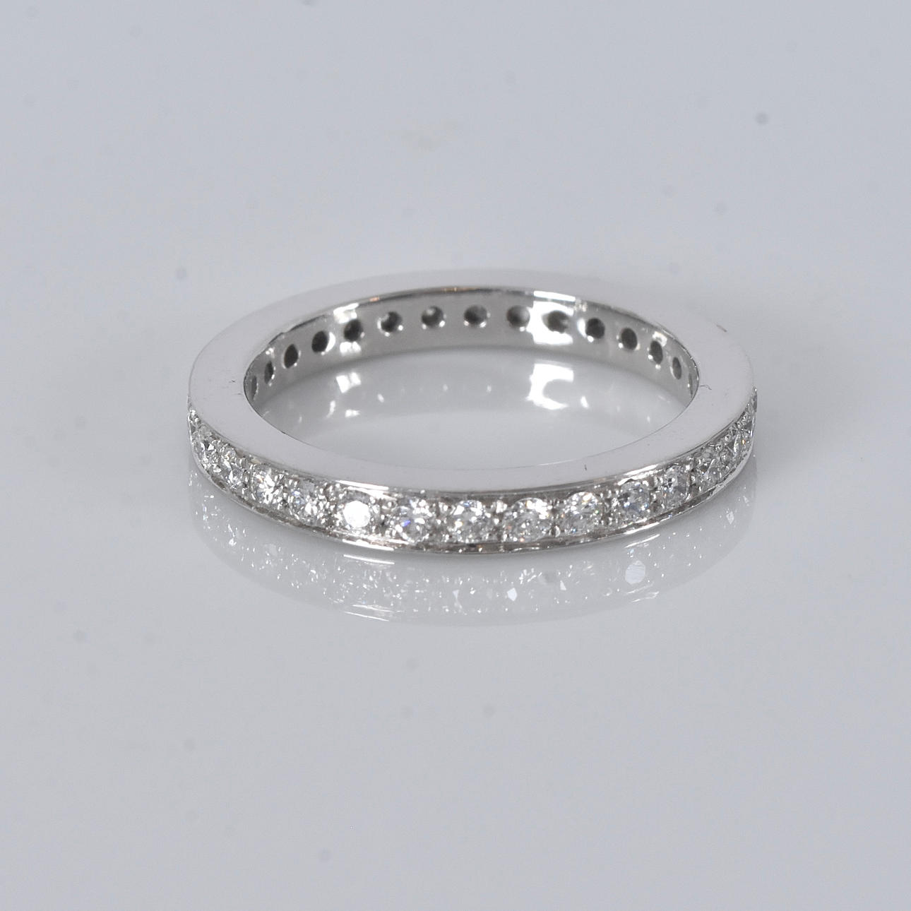 FULL ETERNITY RING, diamonds, total 0.56ct, platinum.