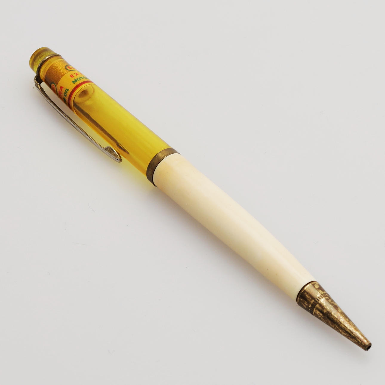 PEN, Esso Extra Motor Oil, 1960s.