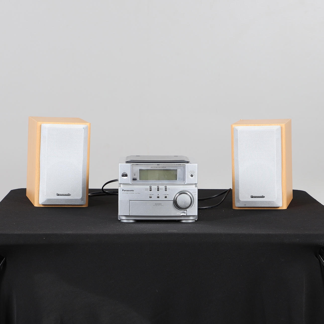 A PANASONIC CD PLAYER AND TWO SPEAKERS.