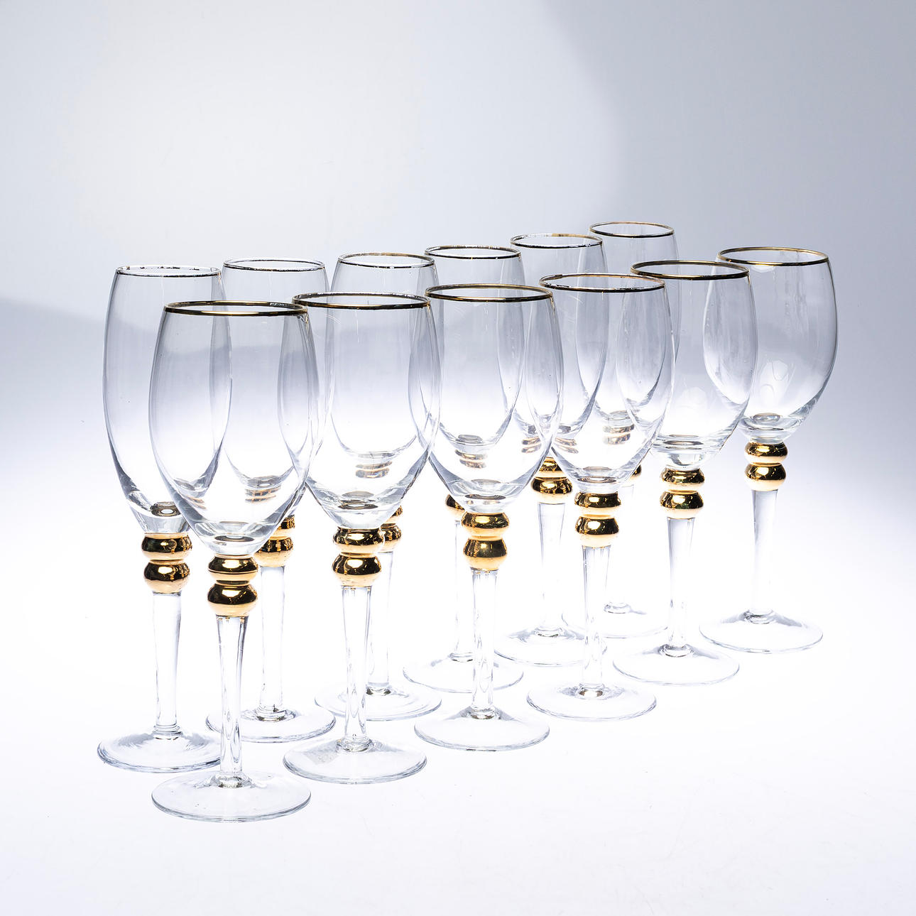 GLASSES, 12 pcs with centered gold-colored sphere.