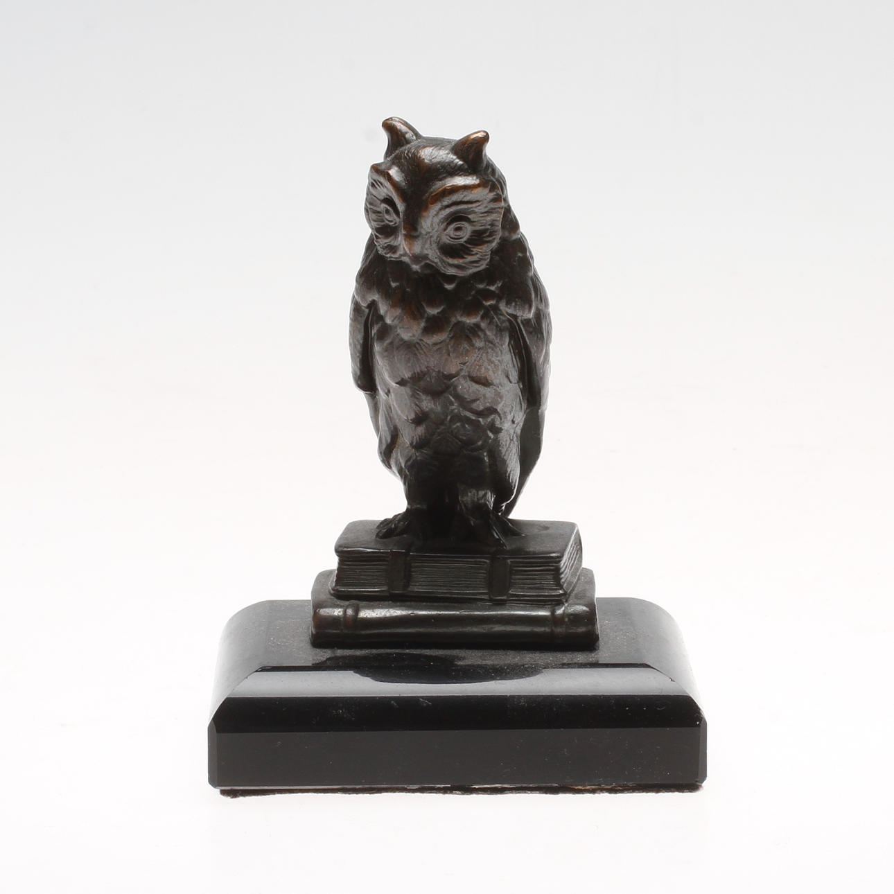 BREVPRESS, sten och patinerad metall, 1900-tal.