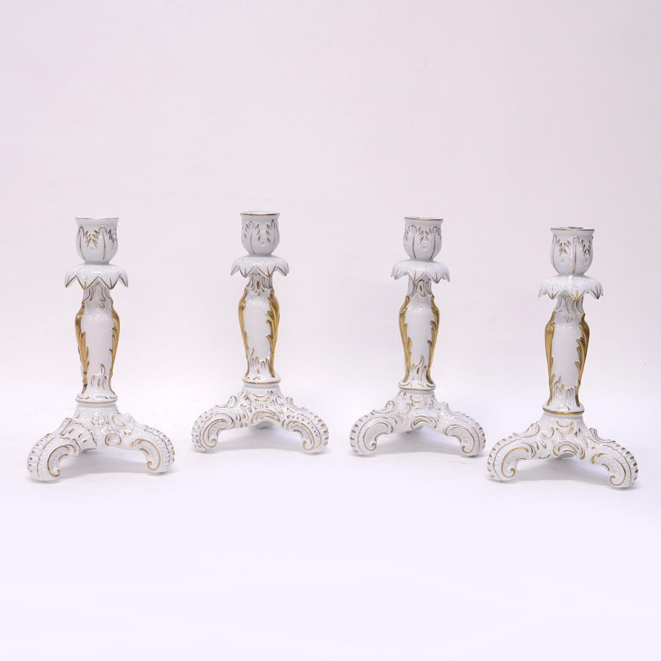 VON SCHIERHOLZ, FOUR CANDLESTICKS.