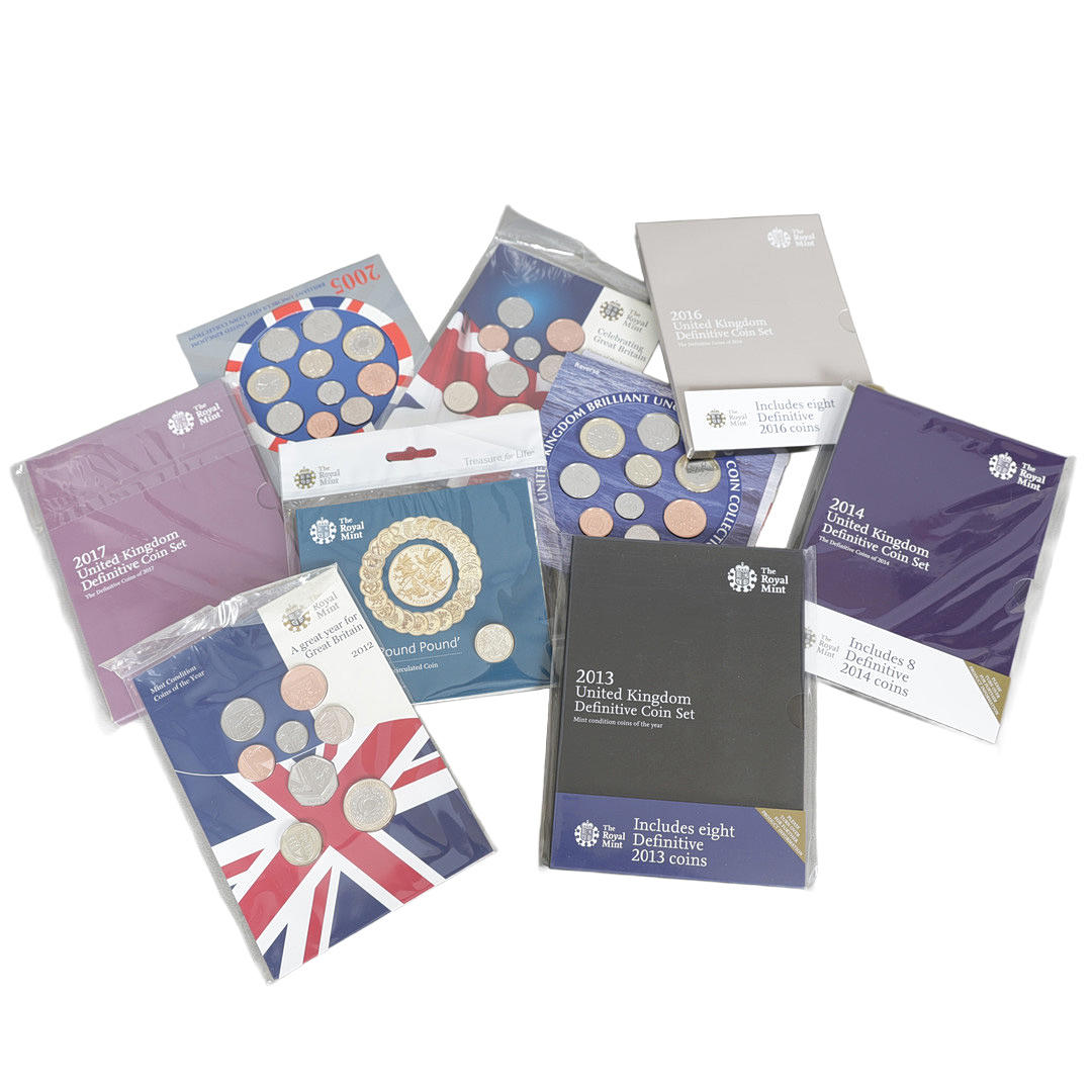 NINE ROYAL MINT COIN COLLECTIONS (9).